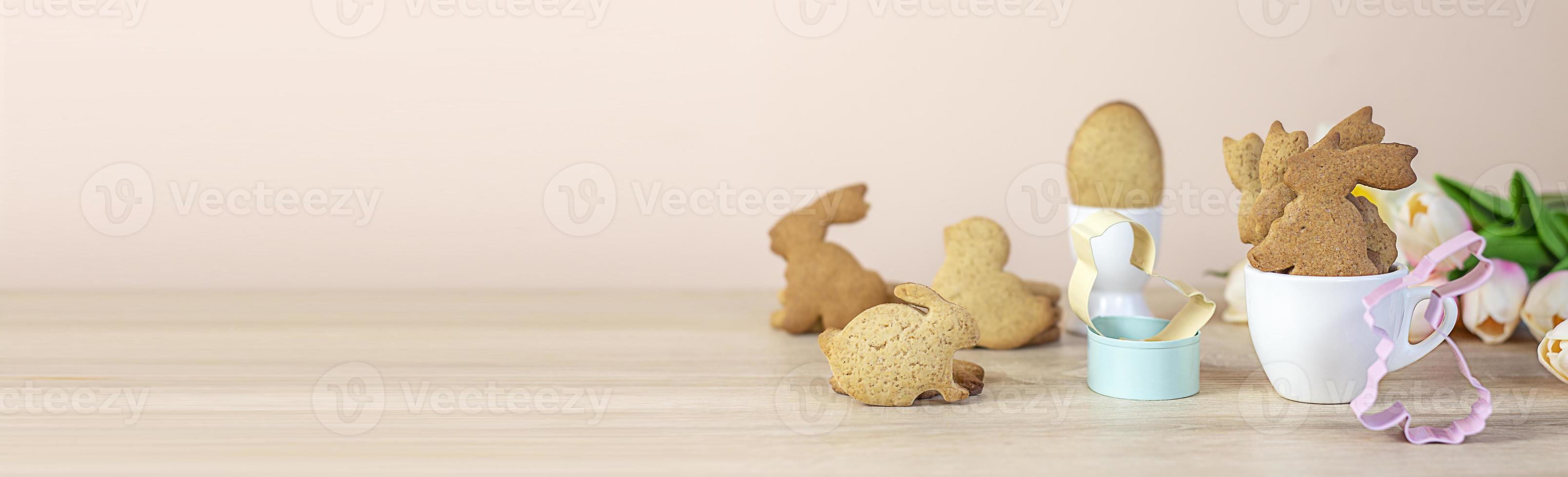 Colorful background with Easter eggs on white wooden board background. Happy Easter concept. Copy space photo