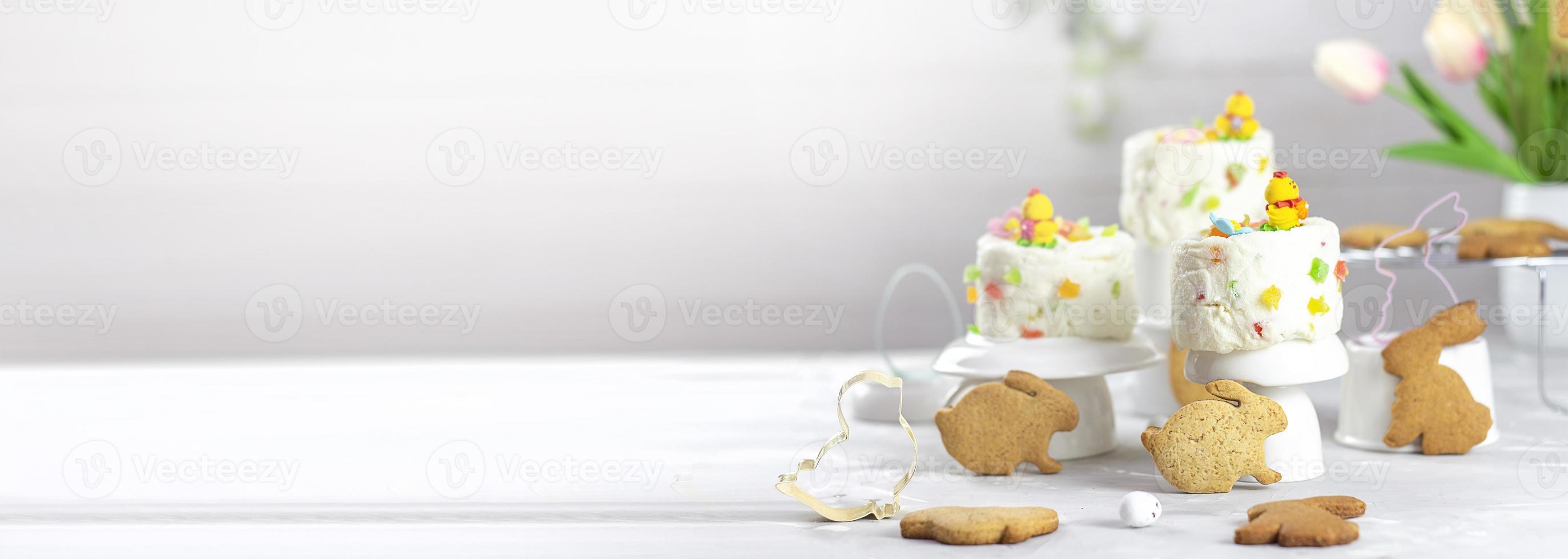 Colorful background with Easter eggs on white wooden board background. Copy space photo