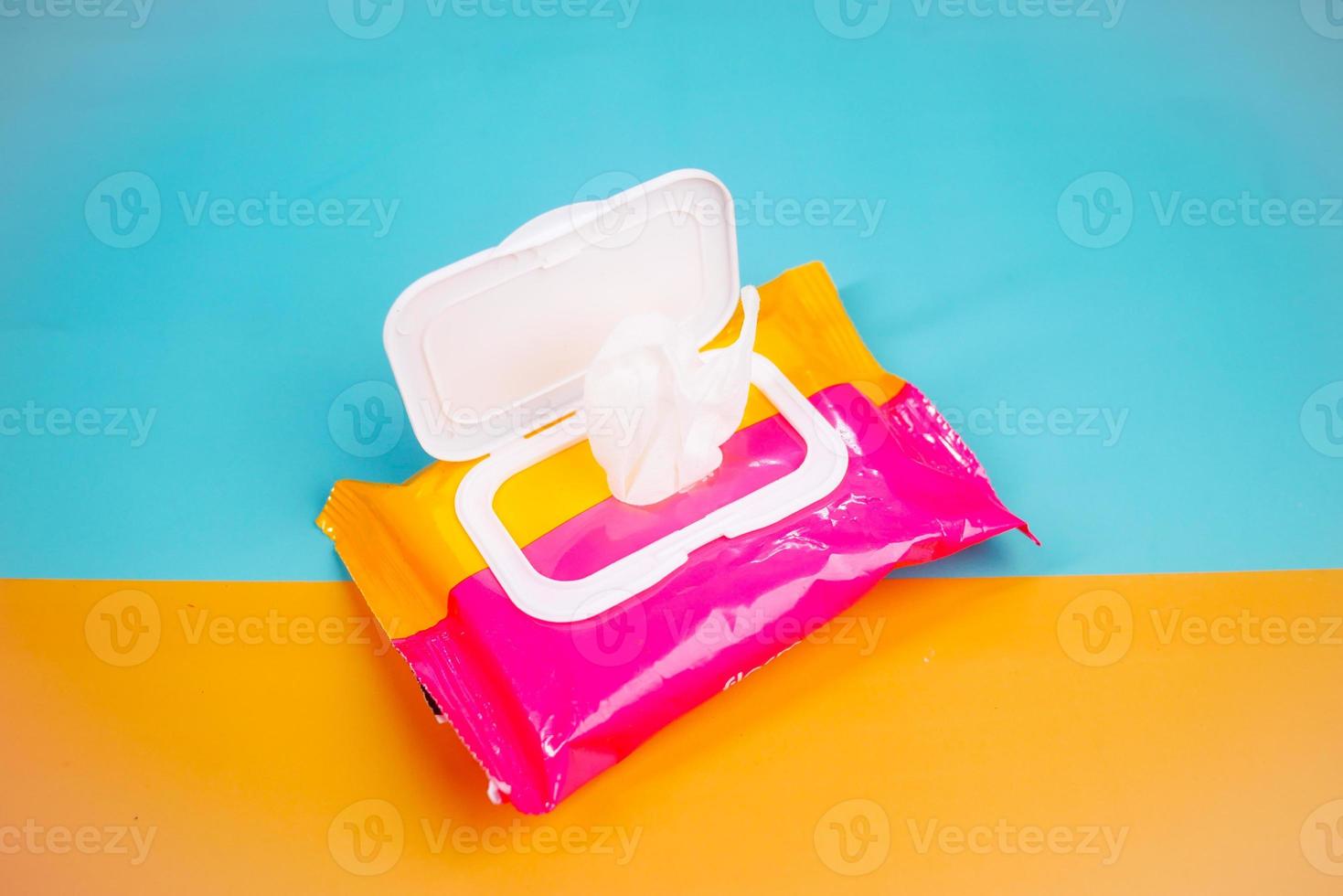 Cleansing wet wipes on table with copy space photo