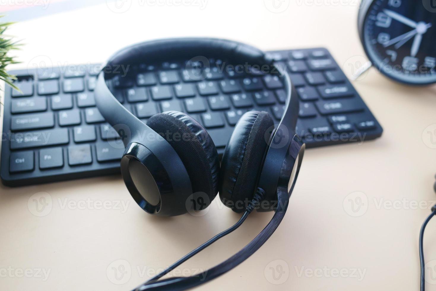 call center headphone on laptop on table , photo