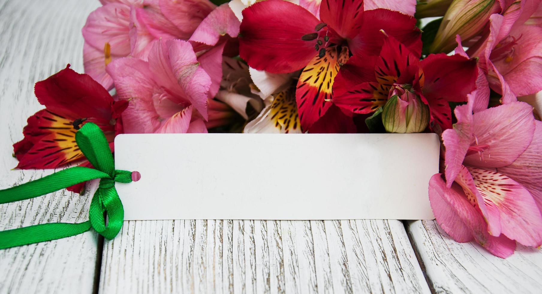 paper card with alstroemeria flowers photo