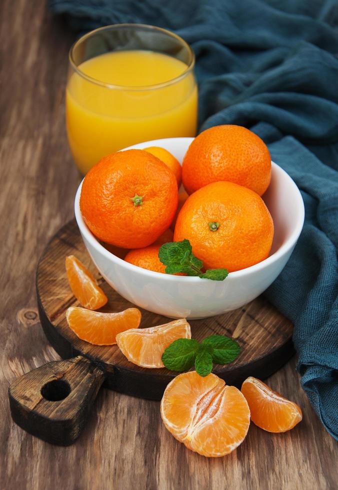 Glass of tangerine juice photo