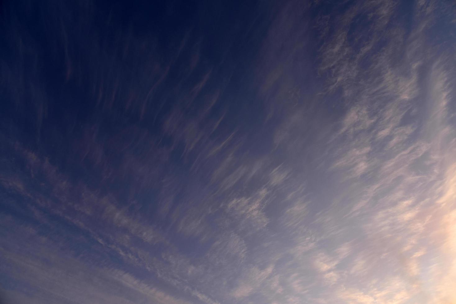 Beautiful rose blue evening sunset with clouds photo