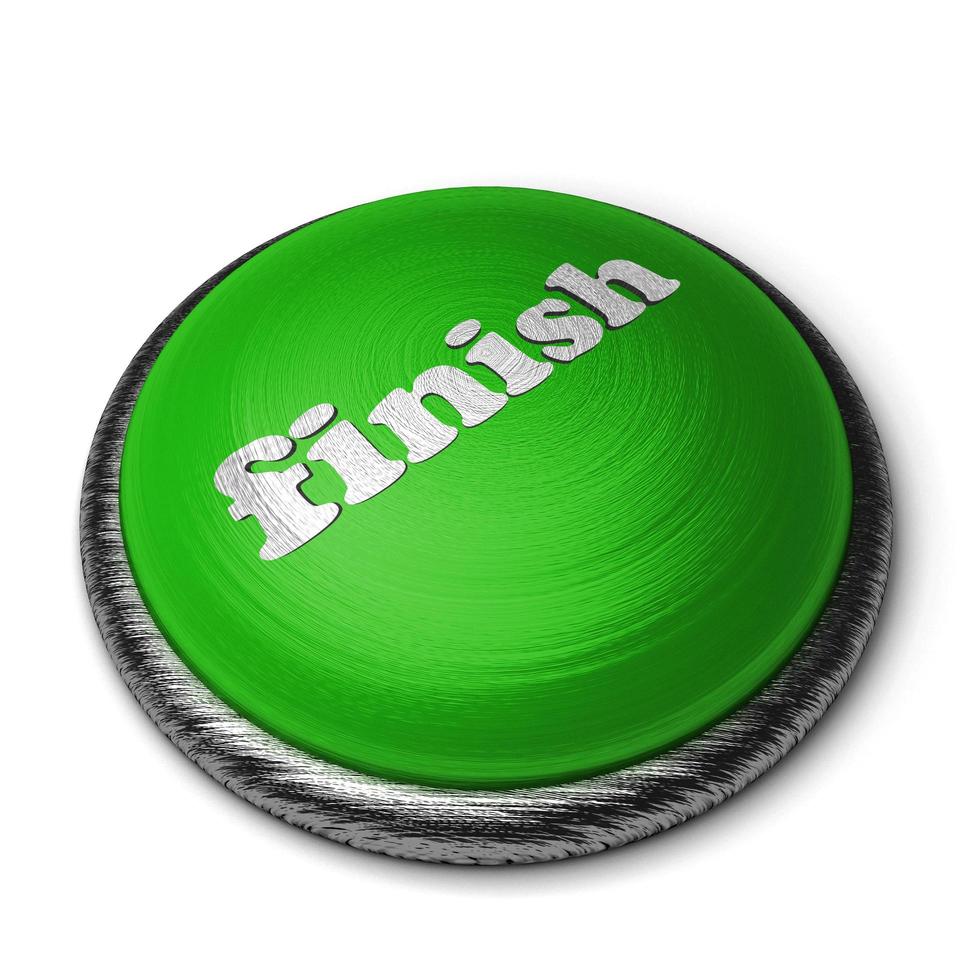 Terminar la palabra en el botón verde aislado en blanco foto