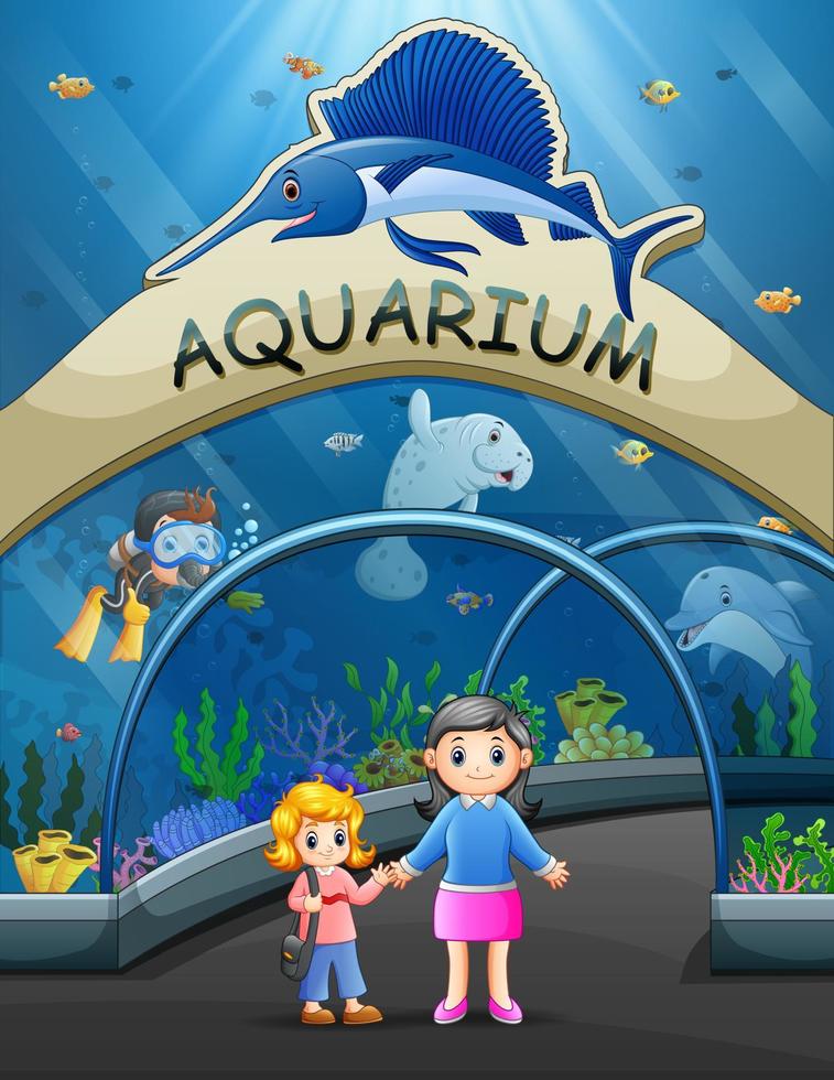 Mother with kid visiting aquarium vector