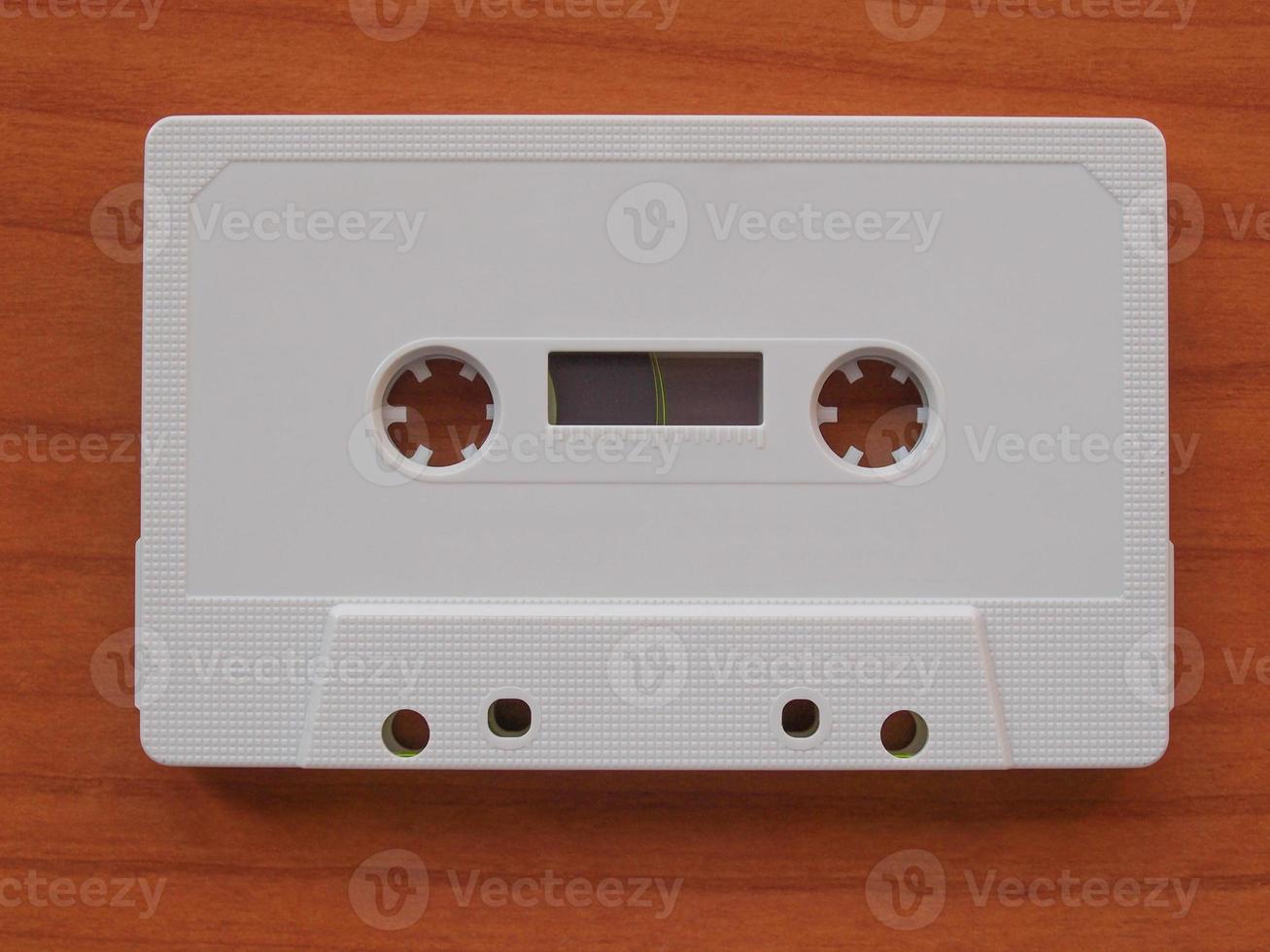 Tape cassette on wooden desktop photo