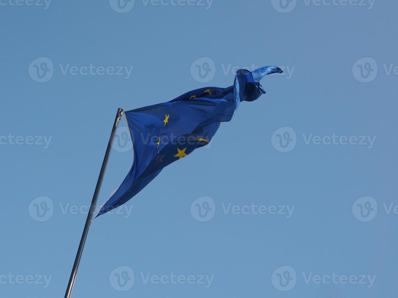 EU flag over blue sky photo