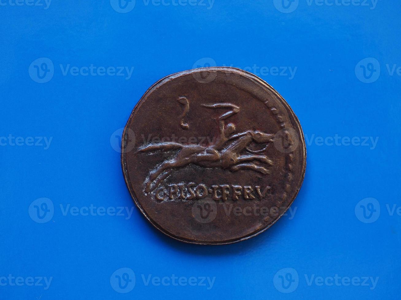 vintage Roman coin over blue photo