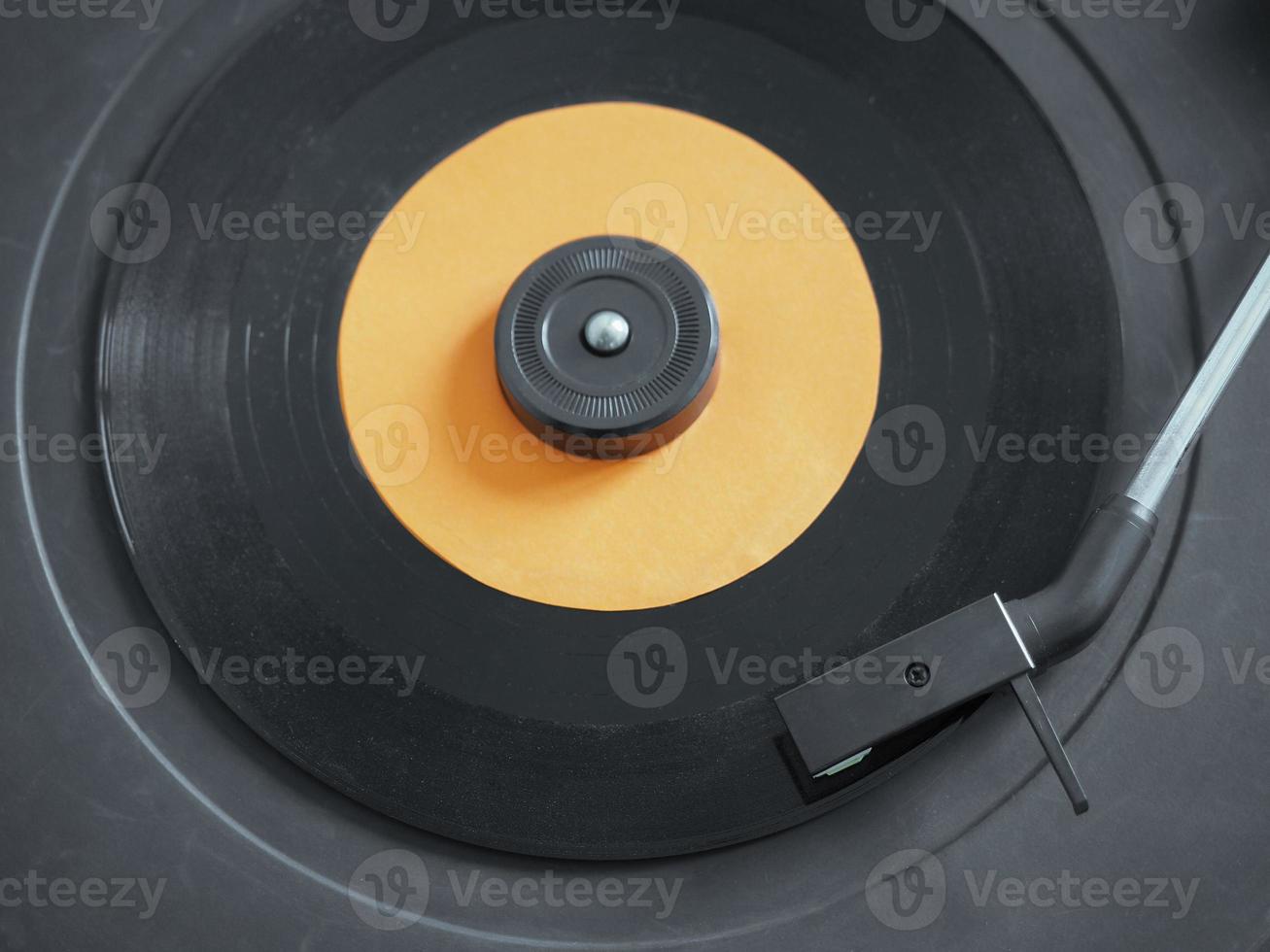 Vinyl record on turntable photo