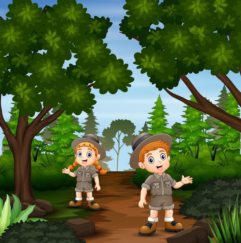 el niño y la niña exploradores en el bosque vector