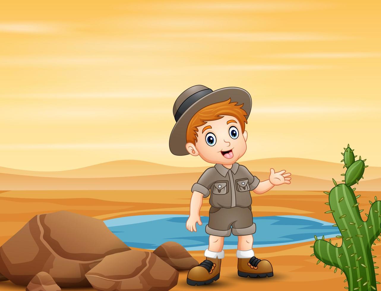 boy scout junto al pequeño estanque en el desierto vector