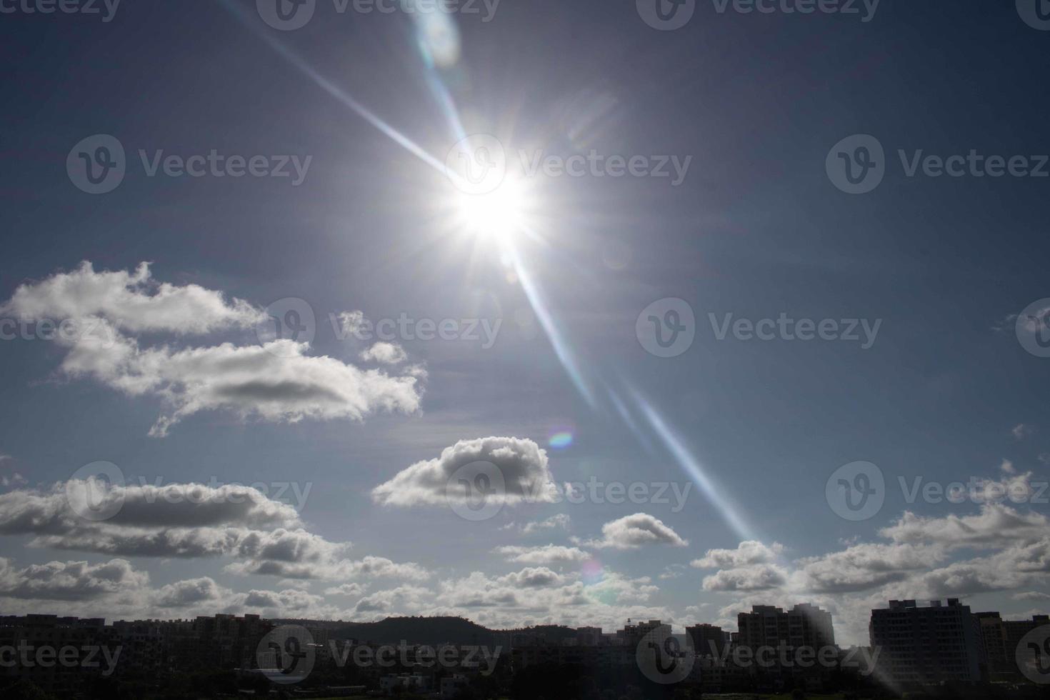 Air clouds in the blue sky photo