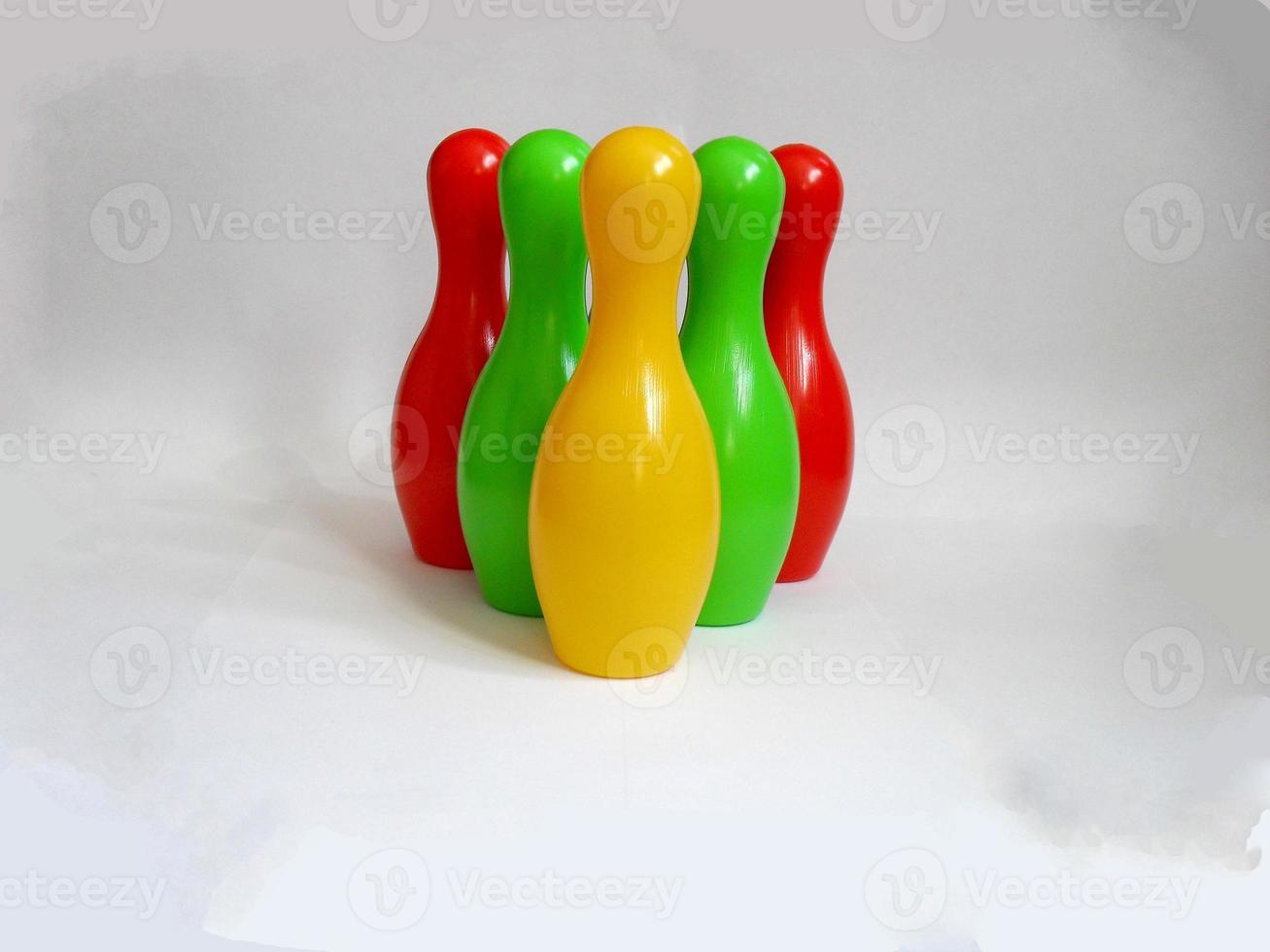 Colorful plastic skittles of toy bowling isolated photo