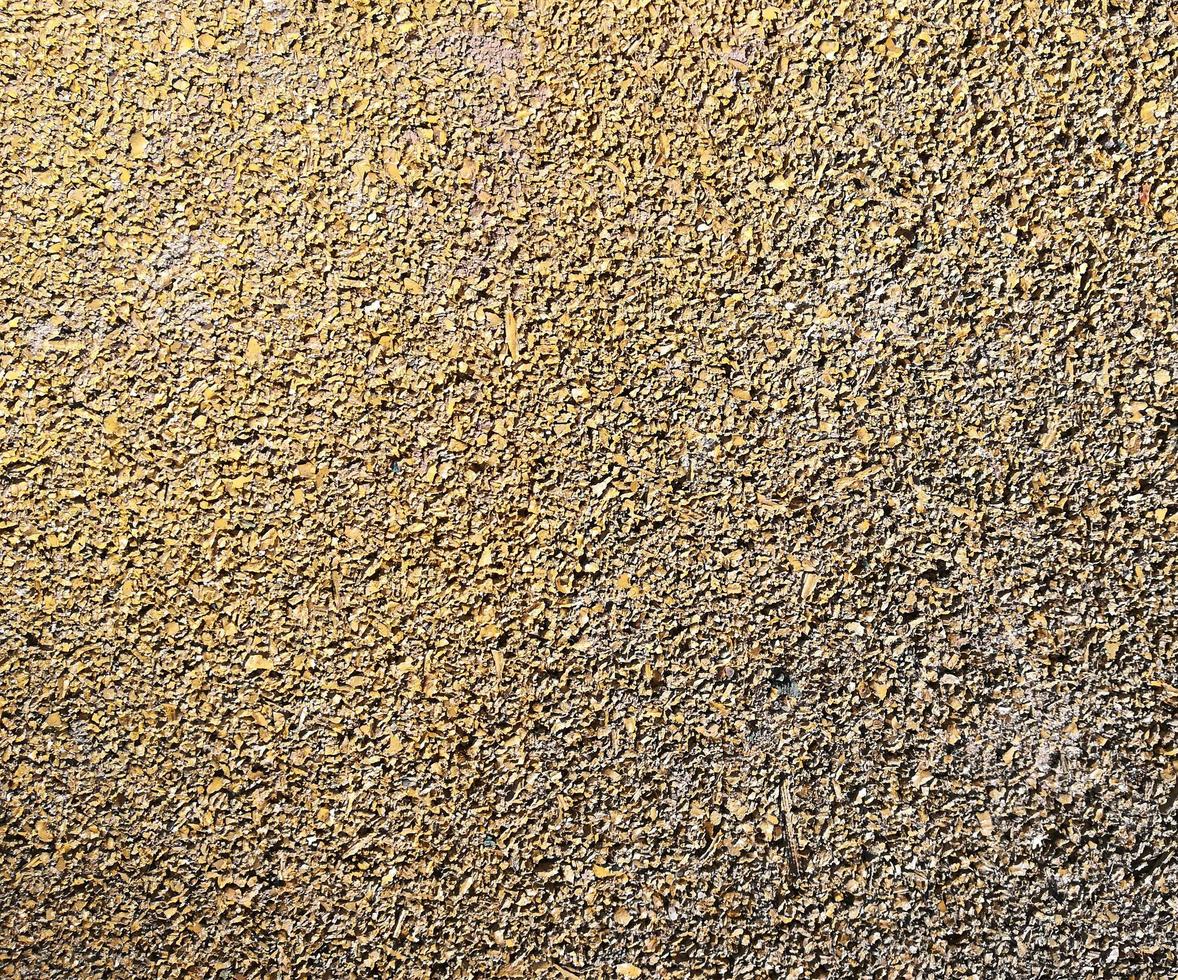 close-up rubber crumb coating. color grainy background texture. photo
