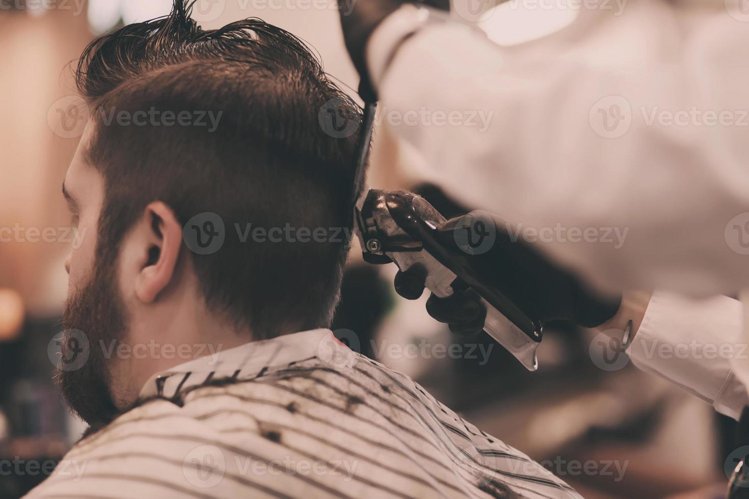 bearded man in barbershop. photo