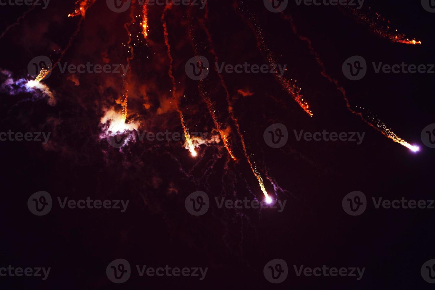 Fireworks display on dark sky photo