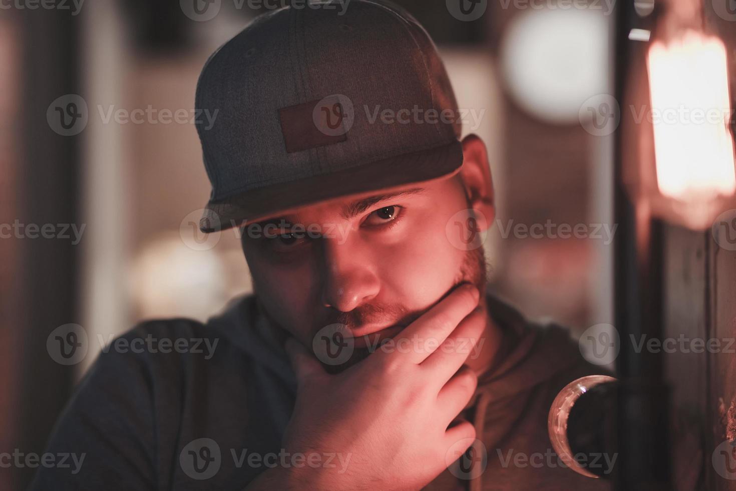 bearded man in a cap photo