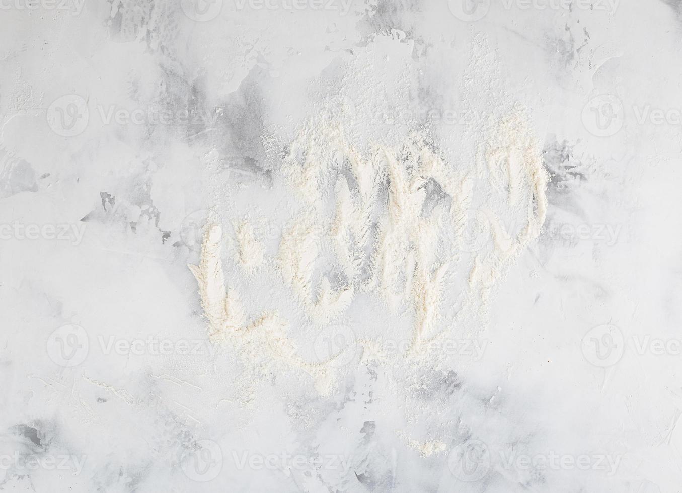 Flour on abstract background photo