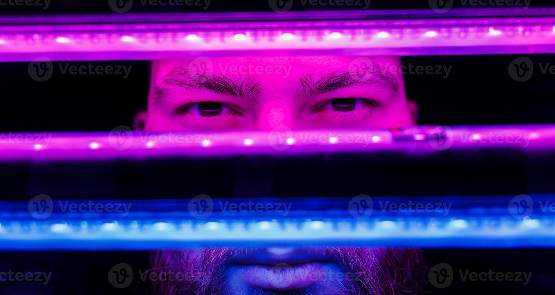 man with neon lights photo