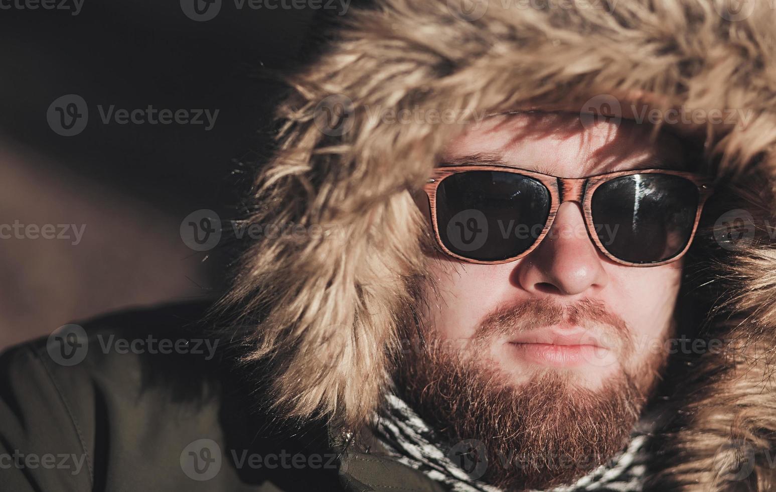 man wearing winter alaska jacket photo