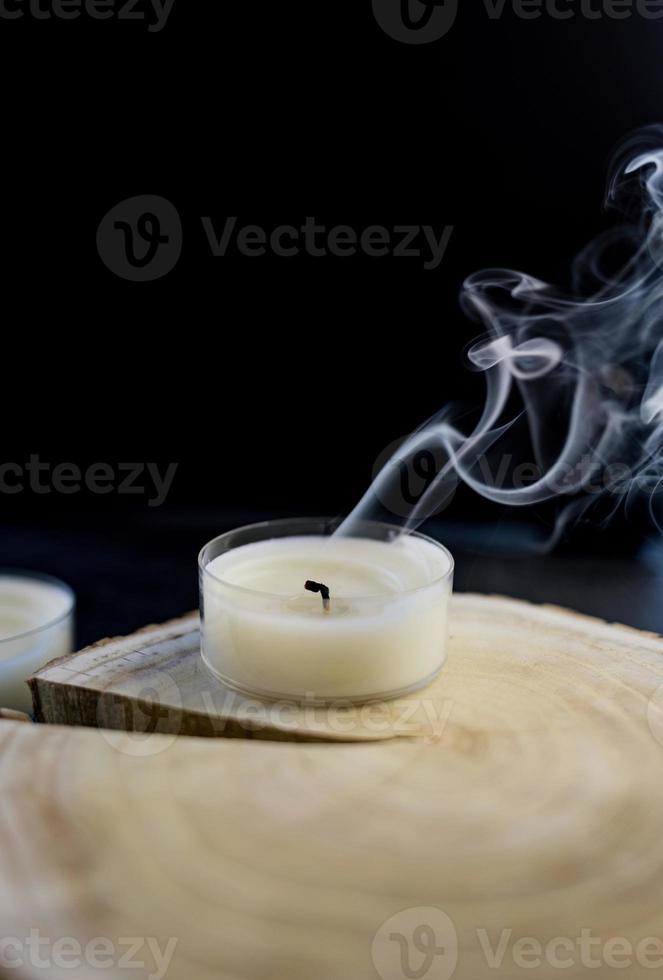 candle with smoke trailing photo