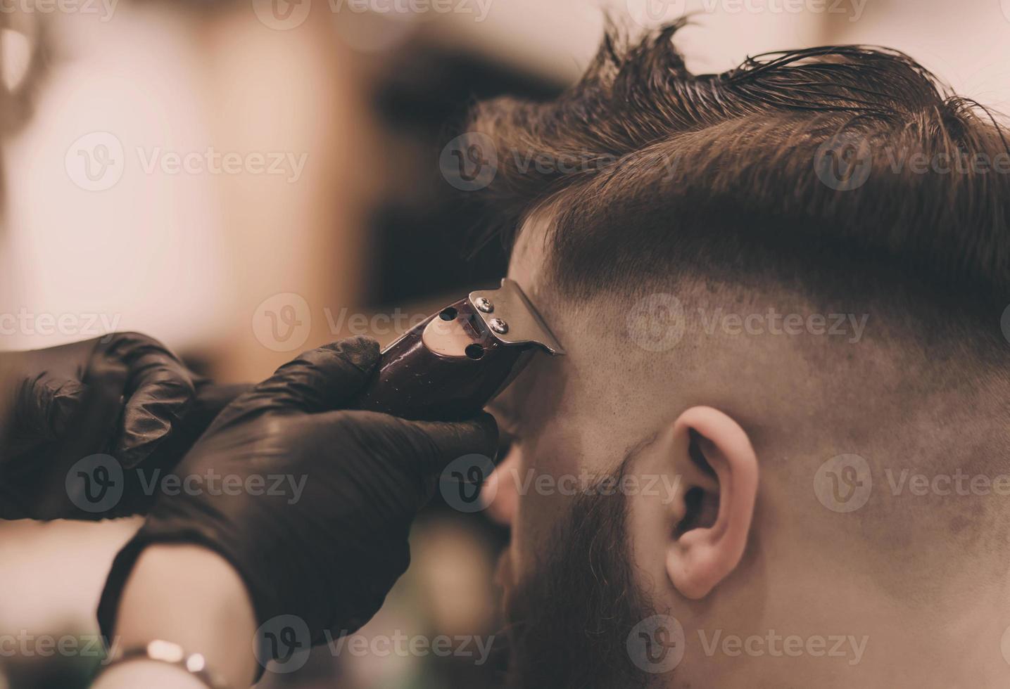 bearded man in barber shop photo