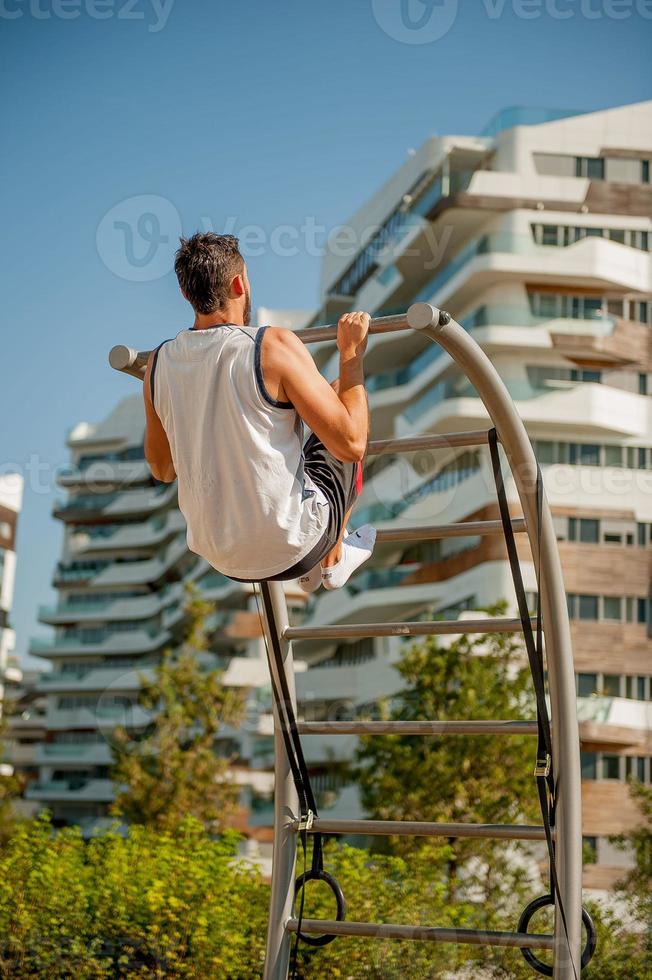 Milan Italy 2017 Boy who does gymnastics in the park photo