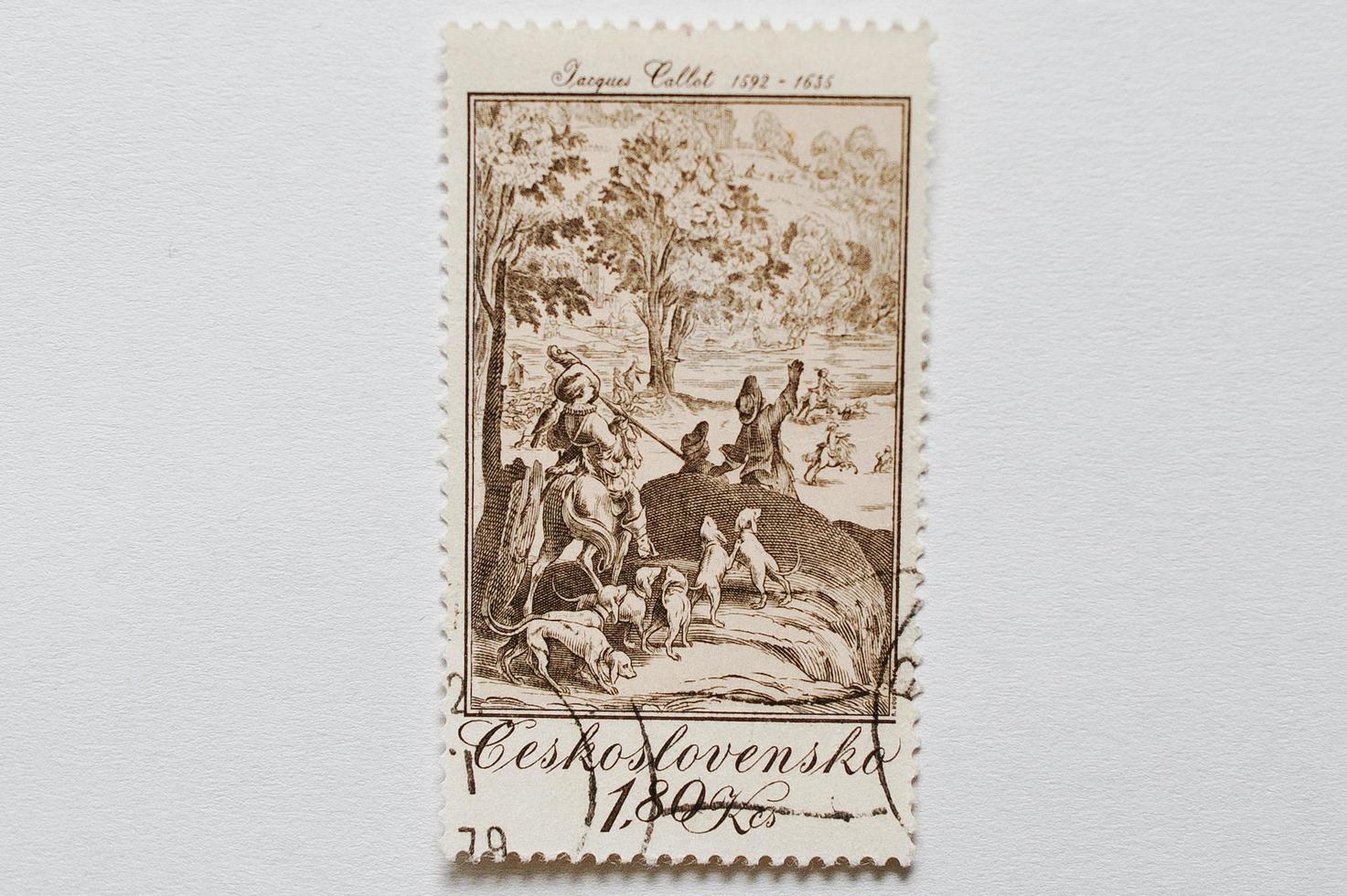 A post stamp printed in Czechoslovakia shows The Large Hunt, paint work of Jacques Callot, baroque printmaker and draftsman from the Duchy of Lorraine, circa 1979 photo