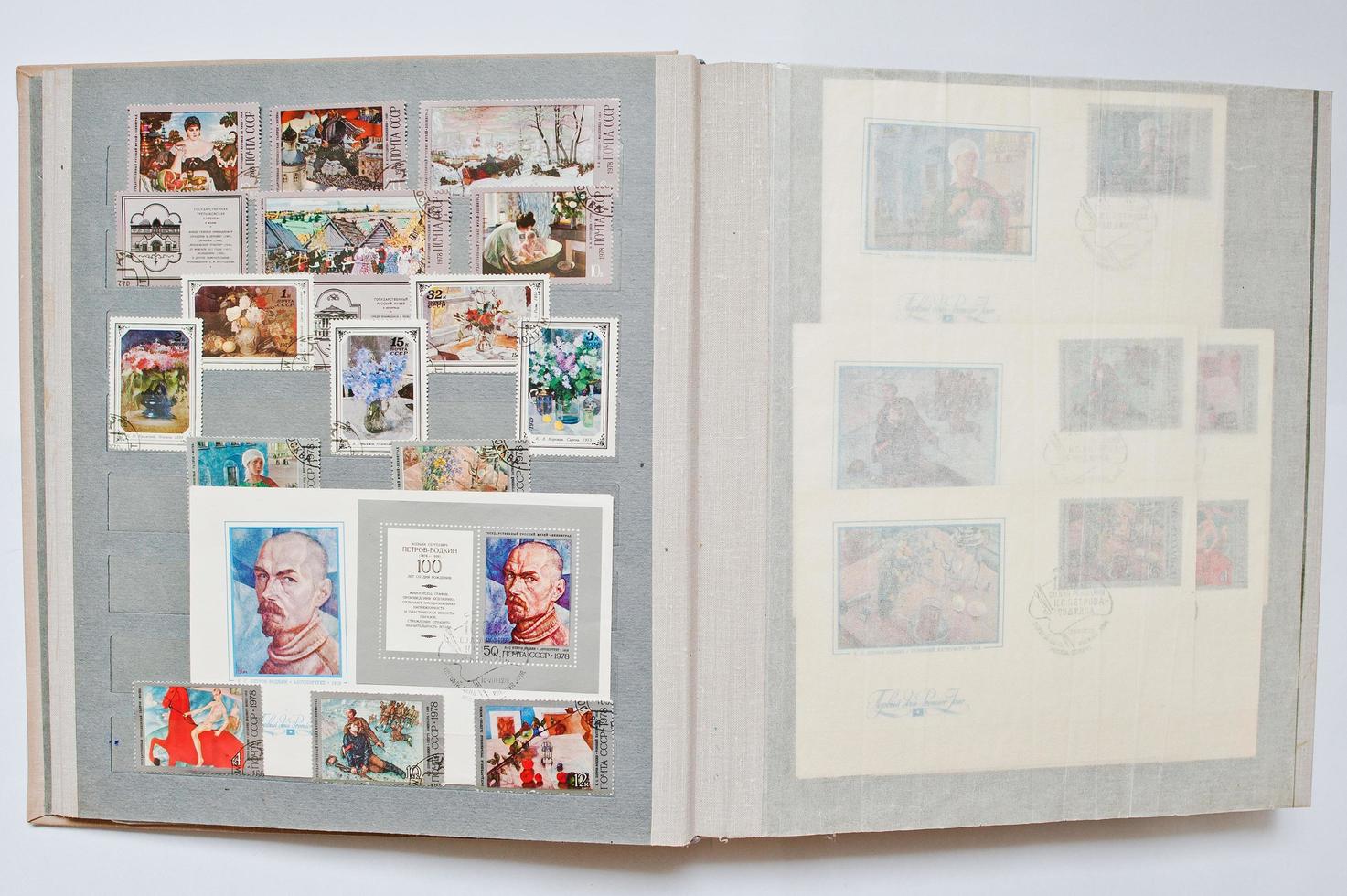 Collection of postage stamps in album printed from USSR, circa 1978 photo