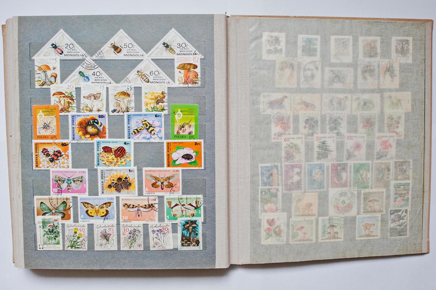 Collection of postage letter with stamps in album printed from different countries and times,  circa 1965-1980 photo