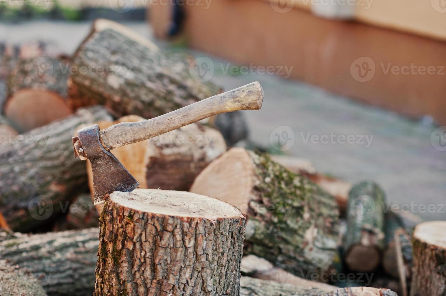 Axe in stump background chopped firewood. photo