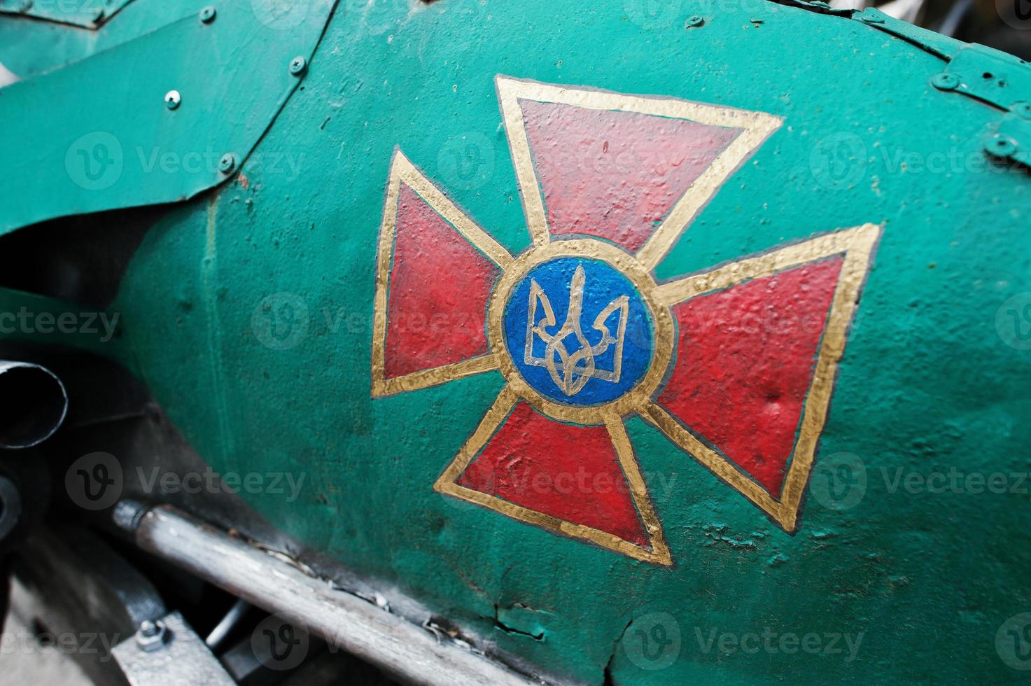 Emblem at military car of the Armed Forces of Ukraine photo