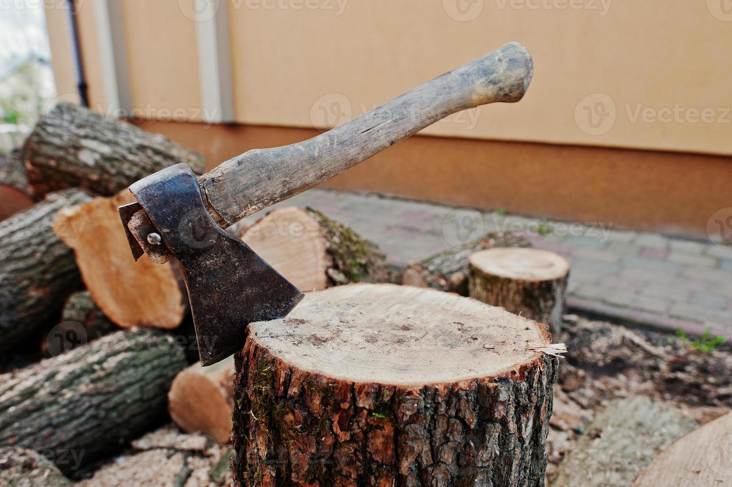 Axe in stump background chopped firewood. photo