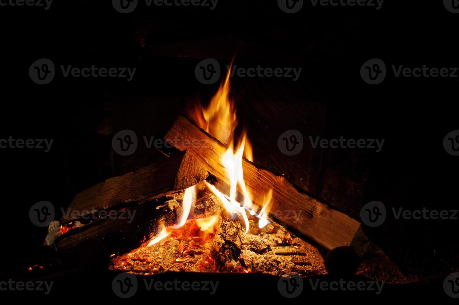 Background warm fire in the fireplace home photo