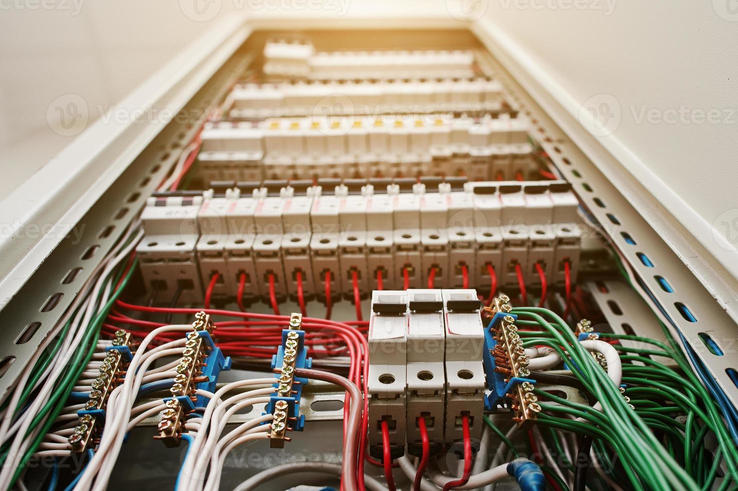 Close up view of electrical panel with fuses and contactors. photo