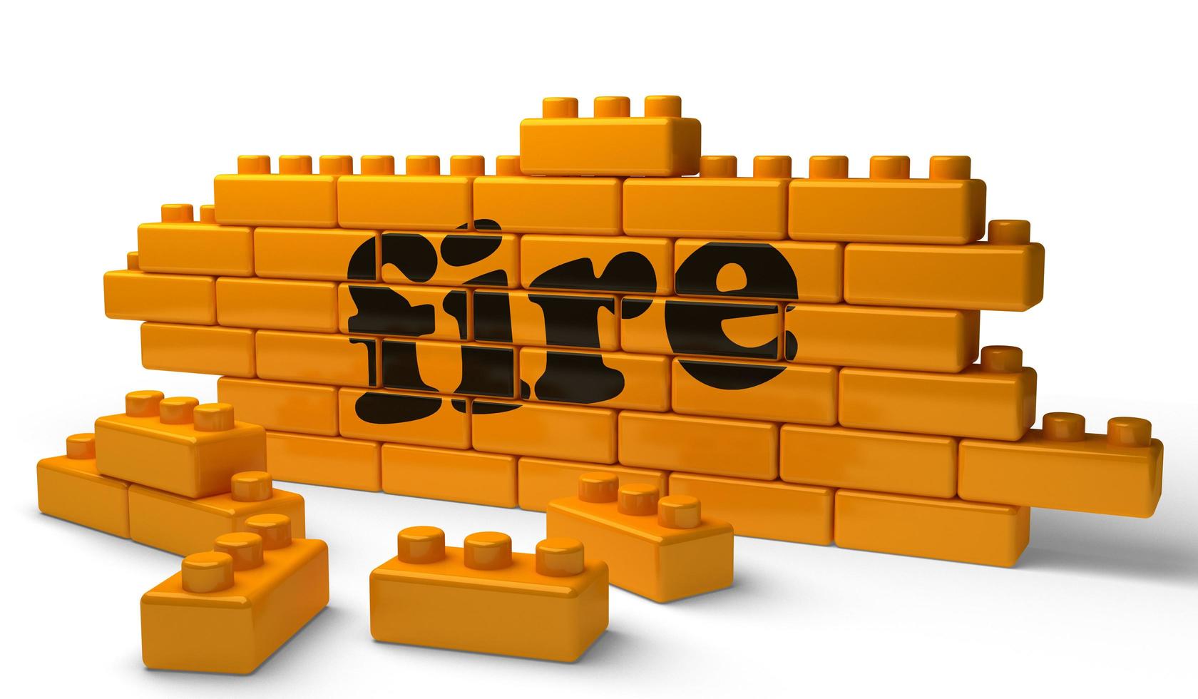 fire word on yellow brick wall photo