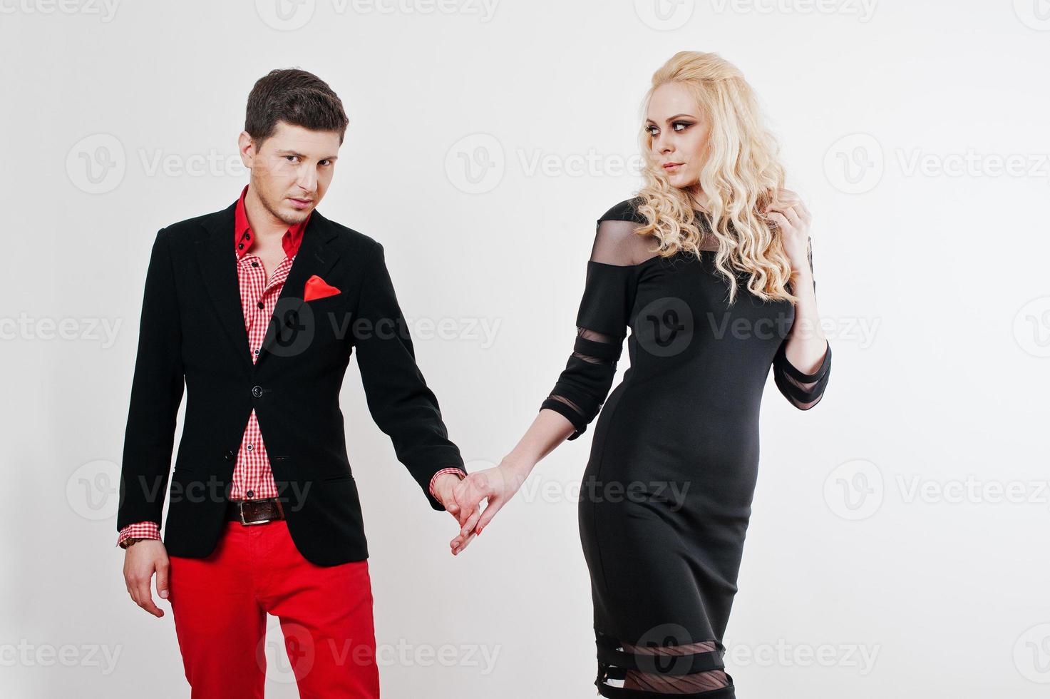 Studio portrait of young stylish beautiful couple in love photo