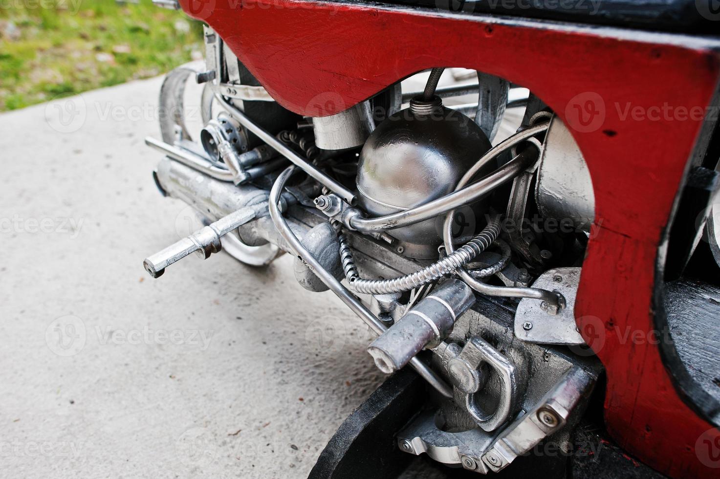 Close up details of  handmade motor engine at motorcycle photo