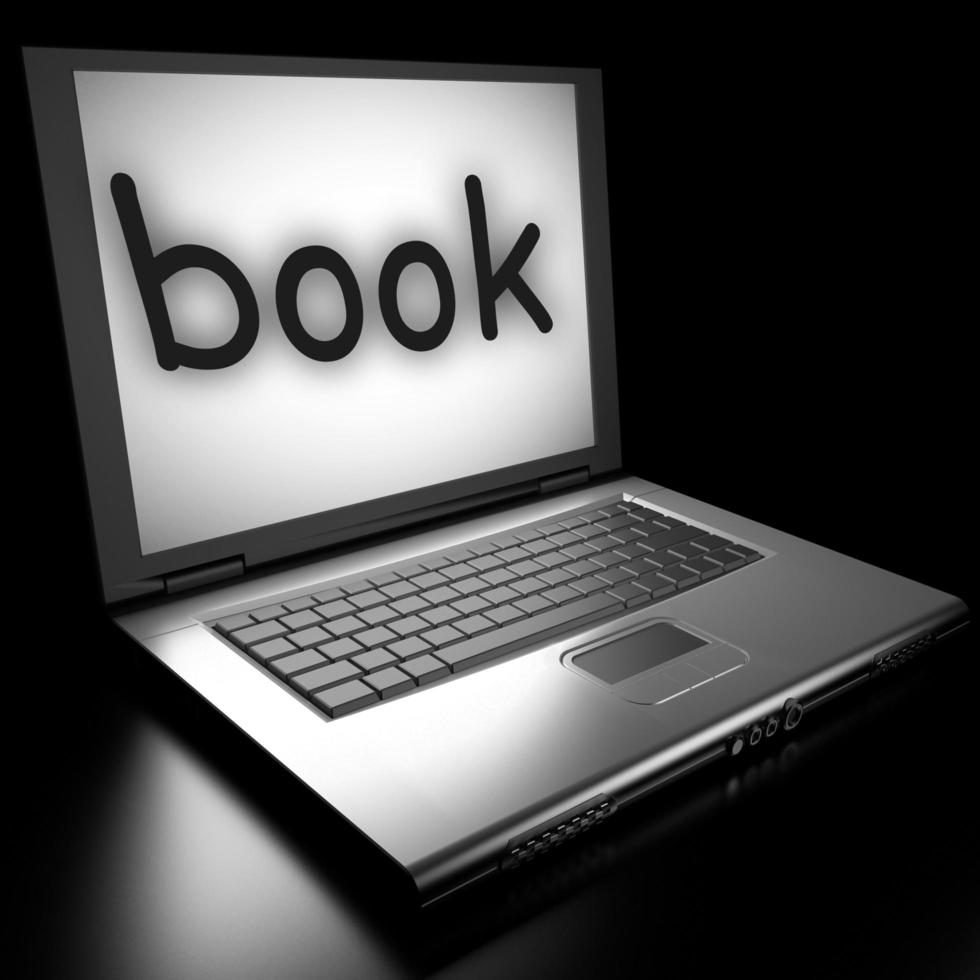 book word on laptop photo