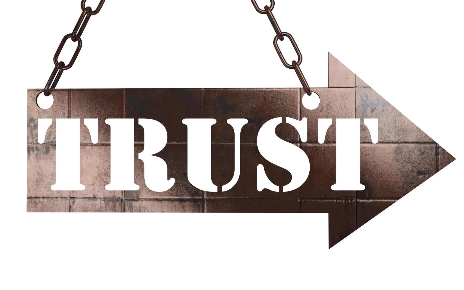 trust word on metal pointer photo