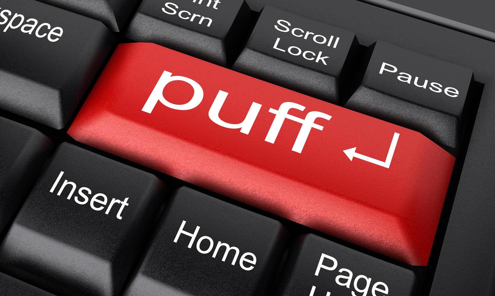 puff word on red keyboard button photo