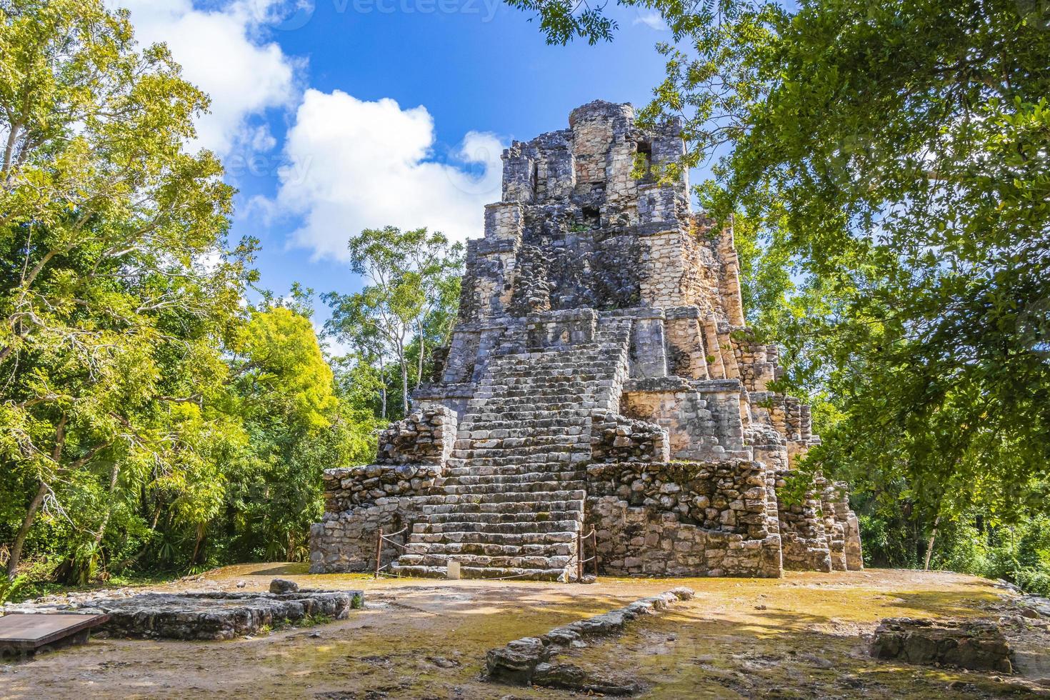 Ancient Mayan site with temple ruins pyramids artifacts Muyil Mexico. photo