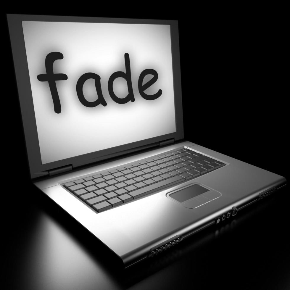 fade word on laptop photo