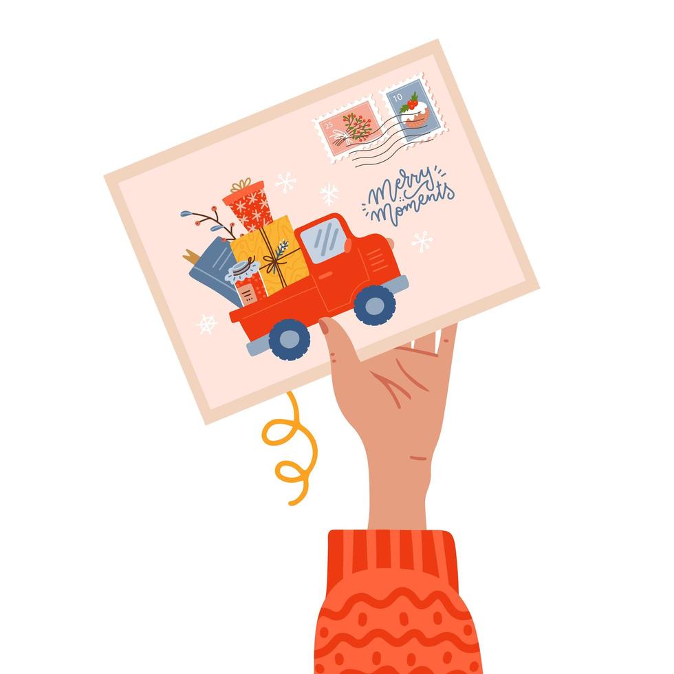 mano femenina sosteniendo una postal con sello de navidad y momentos felices escribiendo texto con una camioneta cargada de regalos. nueva tarjeta de felicitación de año 2022 vector