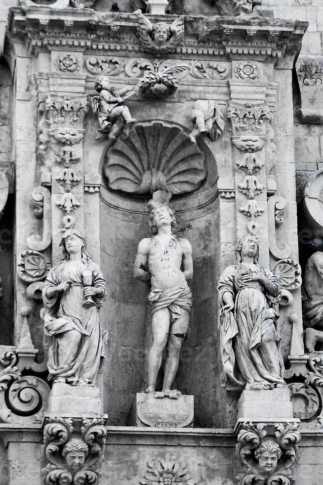 Sculptural group basilica San Sebastiano Ferla, Syracuse, Sicily. photo