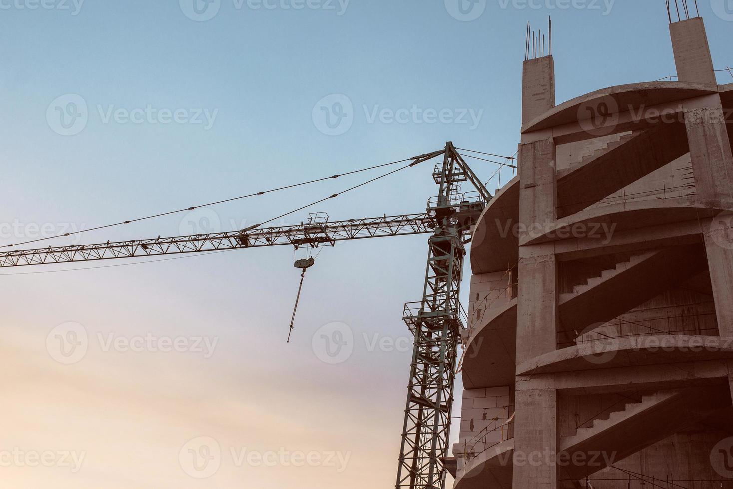 Construction crane building new building outdoor. Urban story photo