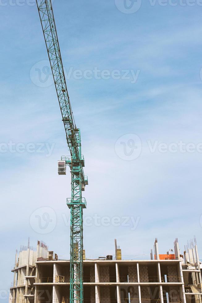 Construction crane building new building outdoor. Urban story photo