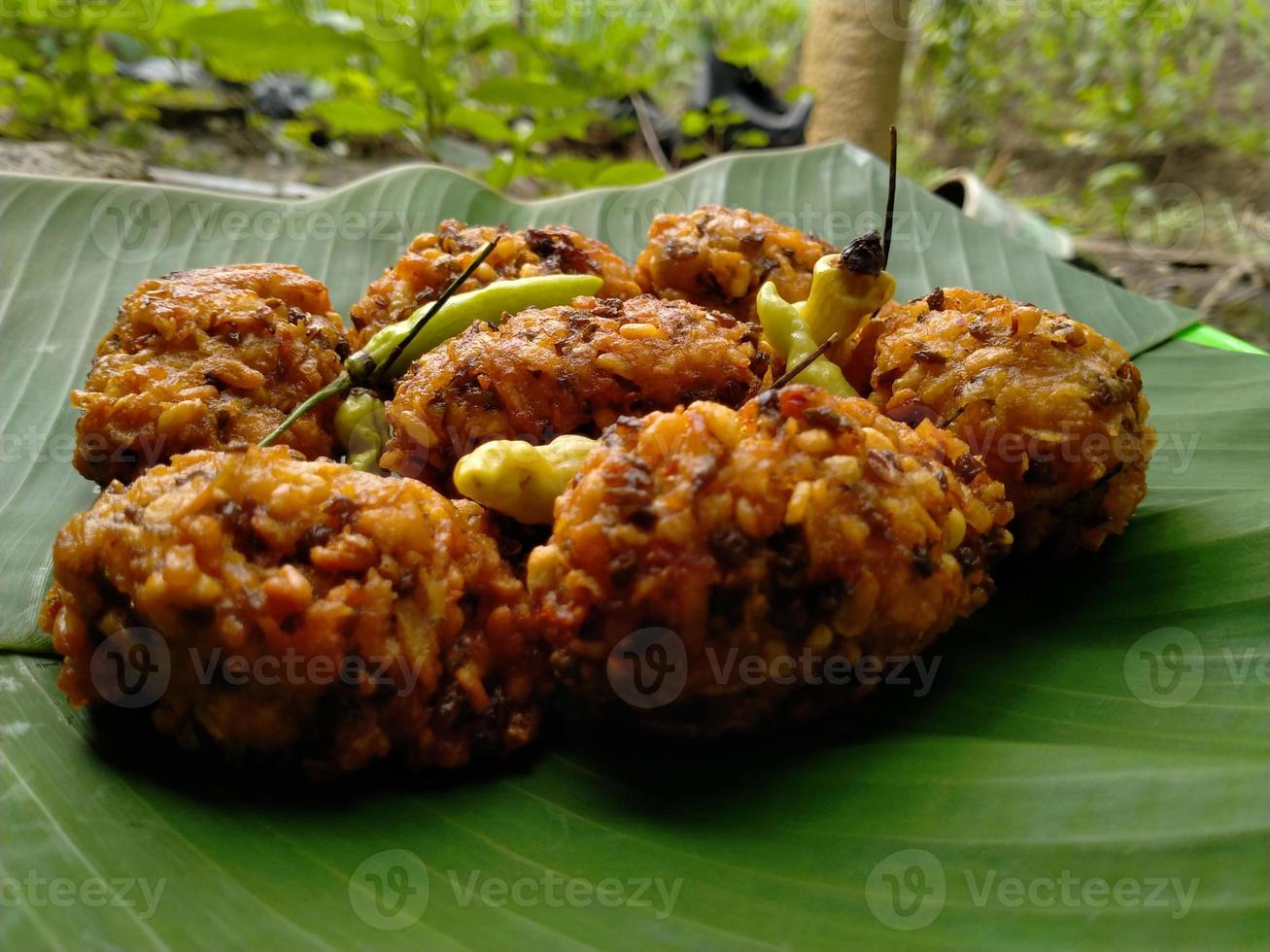 lento food from Indonesia. banana leaf background. close up shot outdoors. photo