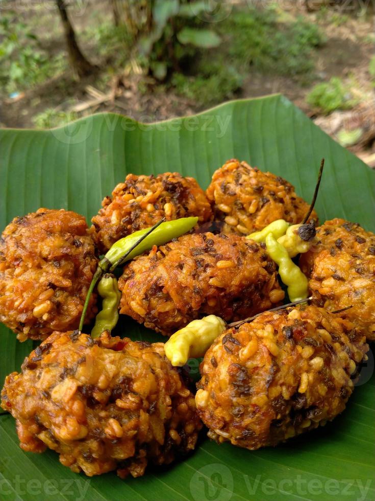 lento food from Indonesia. banana leaf background. close up shot outdoors. photo