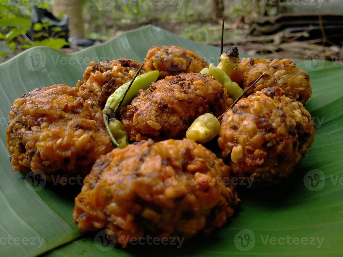 lento food from Indonesia. banana leaf background. close up shot outdoors. photo